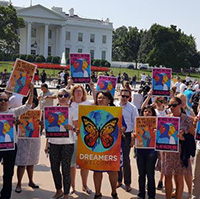 photo of people at rally at White House for Dream Act